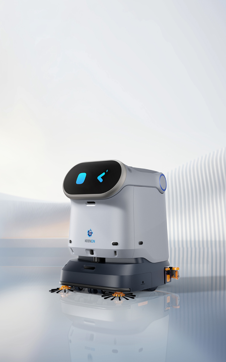 Field engineer and Keenon C40 floor scrubbing robot